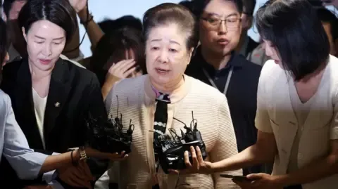 Controversial Religious Head Rejects Bribery Allegations Against Former South Korean President's Wife